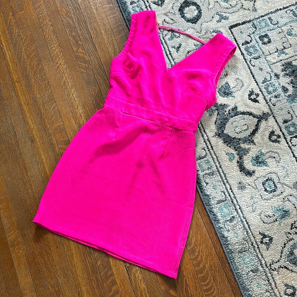 Neon pink cocktail dress with zipper detail in back